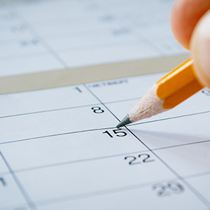 Pencil Marking Date in The Calendar